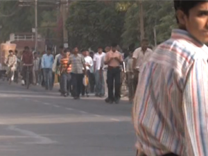 worker on his way to the factory, faridabad