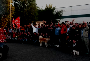 Approximately 50 striking H&M workers in front of the warehouse in Casalpusterlegno, Lombardy